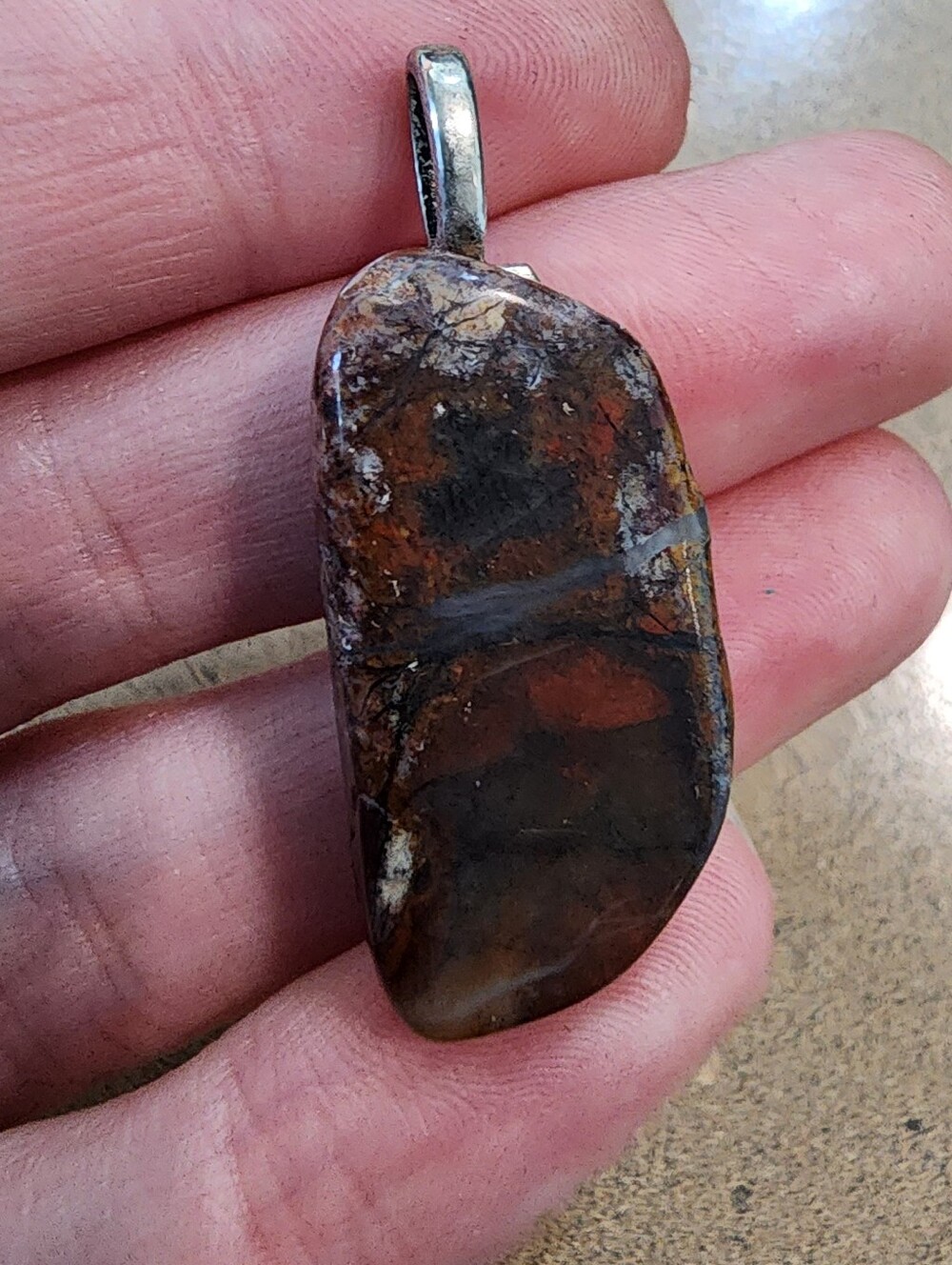 Polished Brown/Red Pendant with Silver Bail